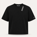 Premium 9dcc deadstock black luxury streetwear T-shirt featuring a clean minimalist layout with a tonal square logo patch near the front hemline.