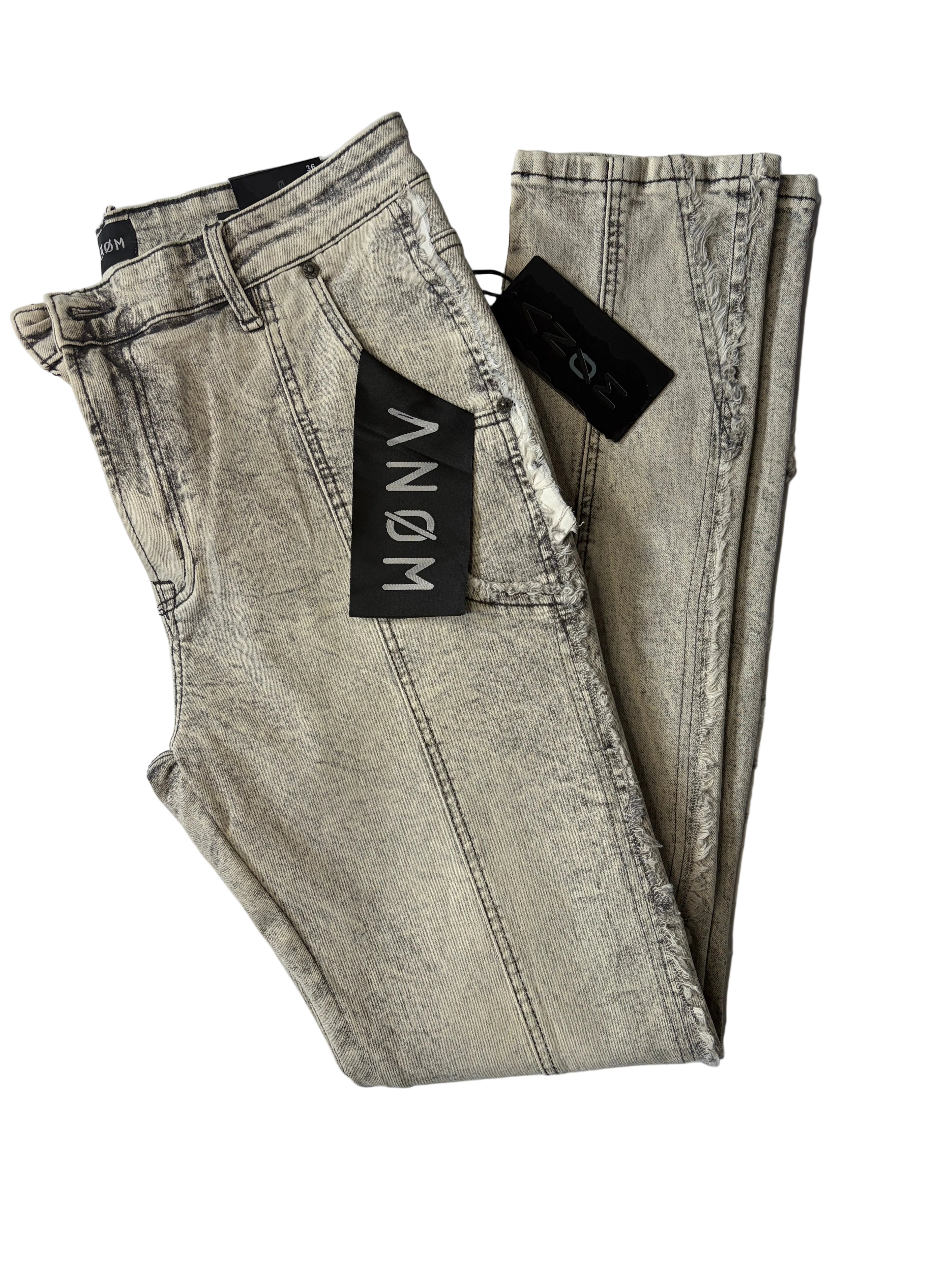 Front layout of AMNÉ modern streetwear denim jeans in a textured grey acid wash. Showcases distinct center-leg panel seams, traditional front pockets, heavily marbled fabric textures, and original brand tags.