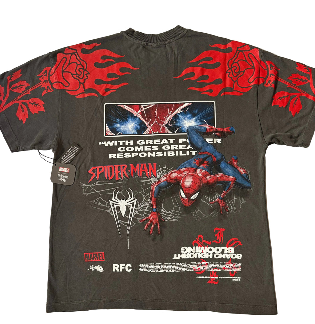 The back of a vintage black Civil Regime x Marvel Spider-Man graphic T-shirt featuring a large illustration of Spider-Man crawling forward on a spiderweb. Above the illustration is a rectangular graphic of Spider-Man's glowing blue eyes, accompanied by the white text quote, "WITH GREAT POWER COMES GREAT RESPONSIBILITY." Large red roses wrapped in flames stretch across the upper back and sleeves, while inverted white "BLOOMING THROUGH CHAOS" text sits near the bottom hem alongside Marvel, Civil Regime, and R