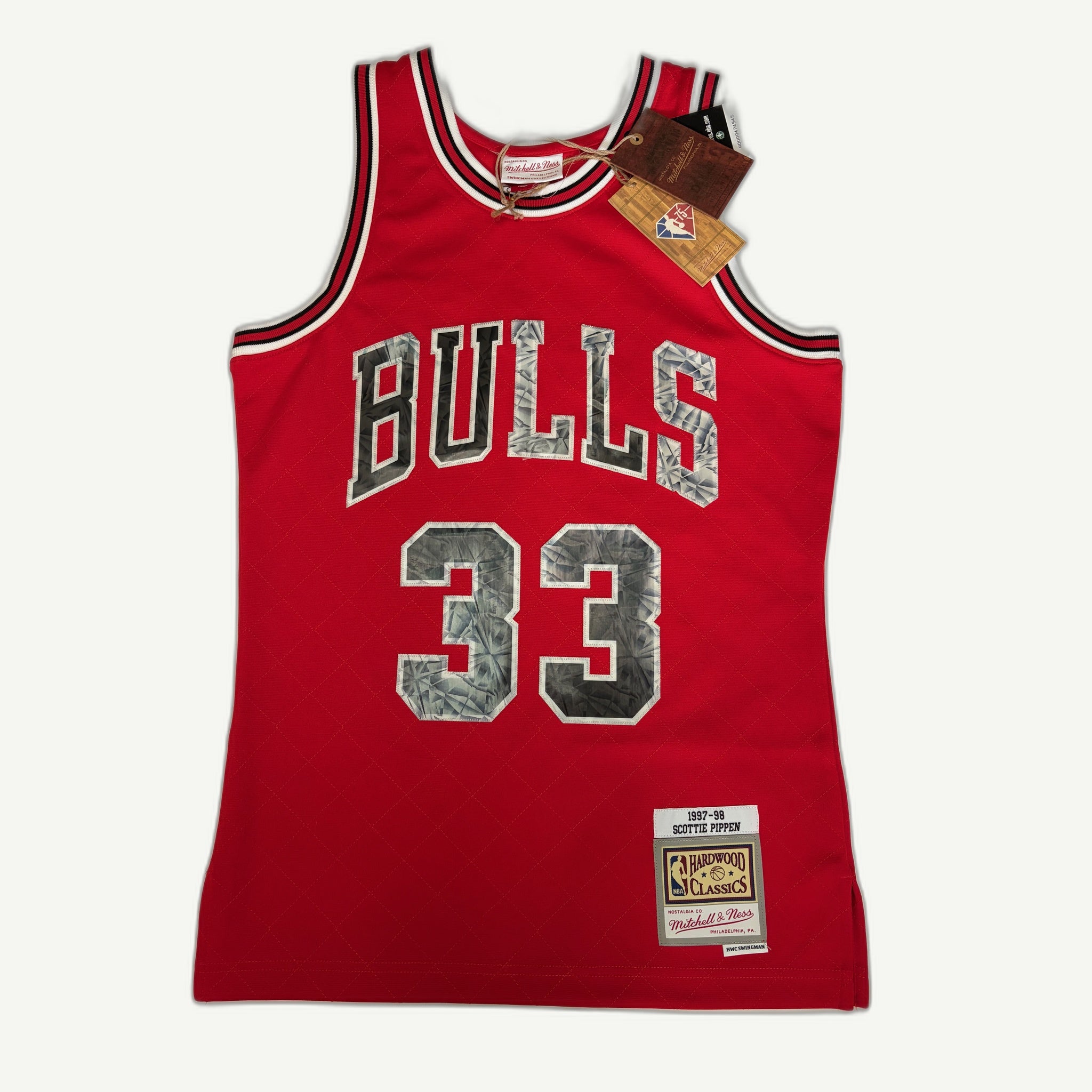 Mitchell & Ness Scottie Pippen Chicago Bulls 1997-98 Hardwood Classics red 75th Anniversary Diamond Swingman jersey featuring textured silver fabric inserts on the typography and number 33.
