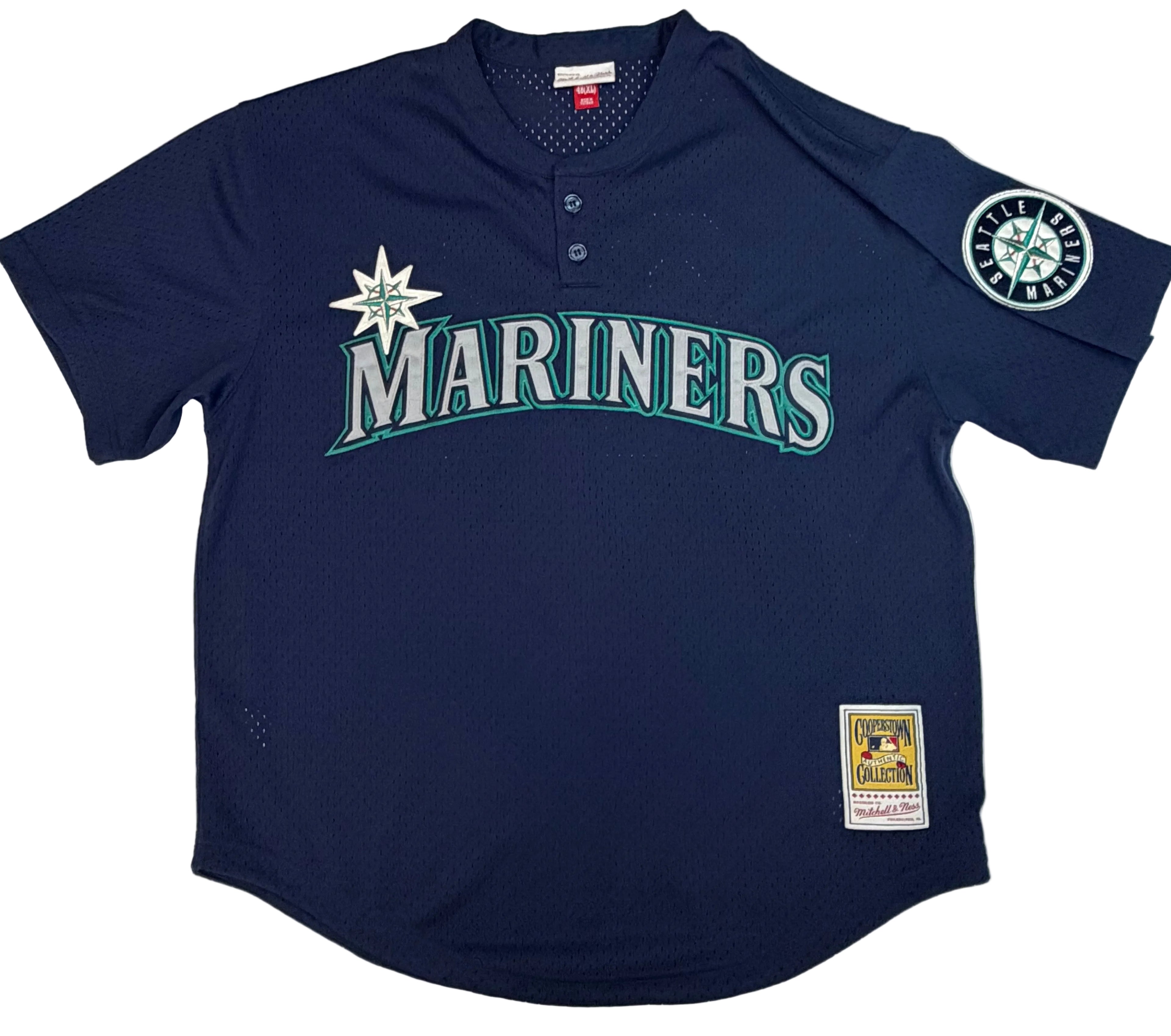 Mitchell & Ness Seattle Mariners Ken Griffey Jr. 1995 Hardwood Classics navy blue mesh batting practice jersey featuring a chest Mariners spellout and number 24 on the back.