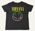 Front flat lay view of an official Nirvana ladies' black graphic t-shirt featuring the arched yellow logo and the iconic cross-eyed smiley face graphic in a colorful sorbet pastel gradient print.
