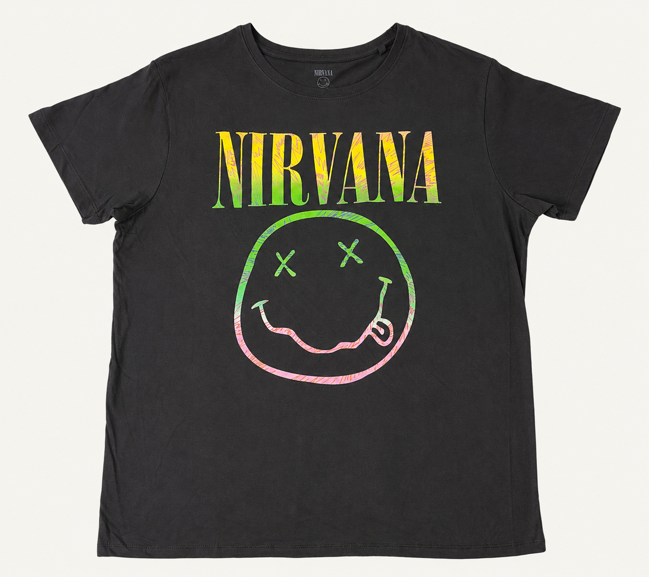 Front flat lay view of an official Nirvana ladies' black graphic t-shirt featuring the arched yellow logo and the iconic cross-eyed smiley face graphic in a colorful sorbet pastel gradient print.