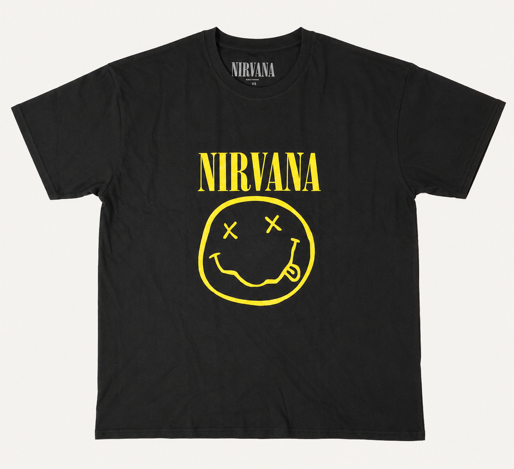 Front flat lay view of an official licensed Nirvana unisex black graphic t-shirt featuring the classic Kurt Cobain yellow smiley face logo and arched band spellout text.