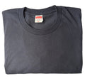 A folded dark gray crewneck t-shirt with a Supreme box logo tag visible inside the collar, laid flat on a white fabric background.