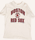 Vintage 1988 Boston Red Sox white T-shirt featuring stacked red and navy block typography framing the franchise sock emblem.