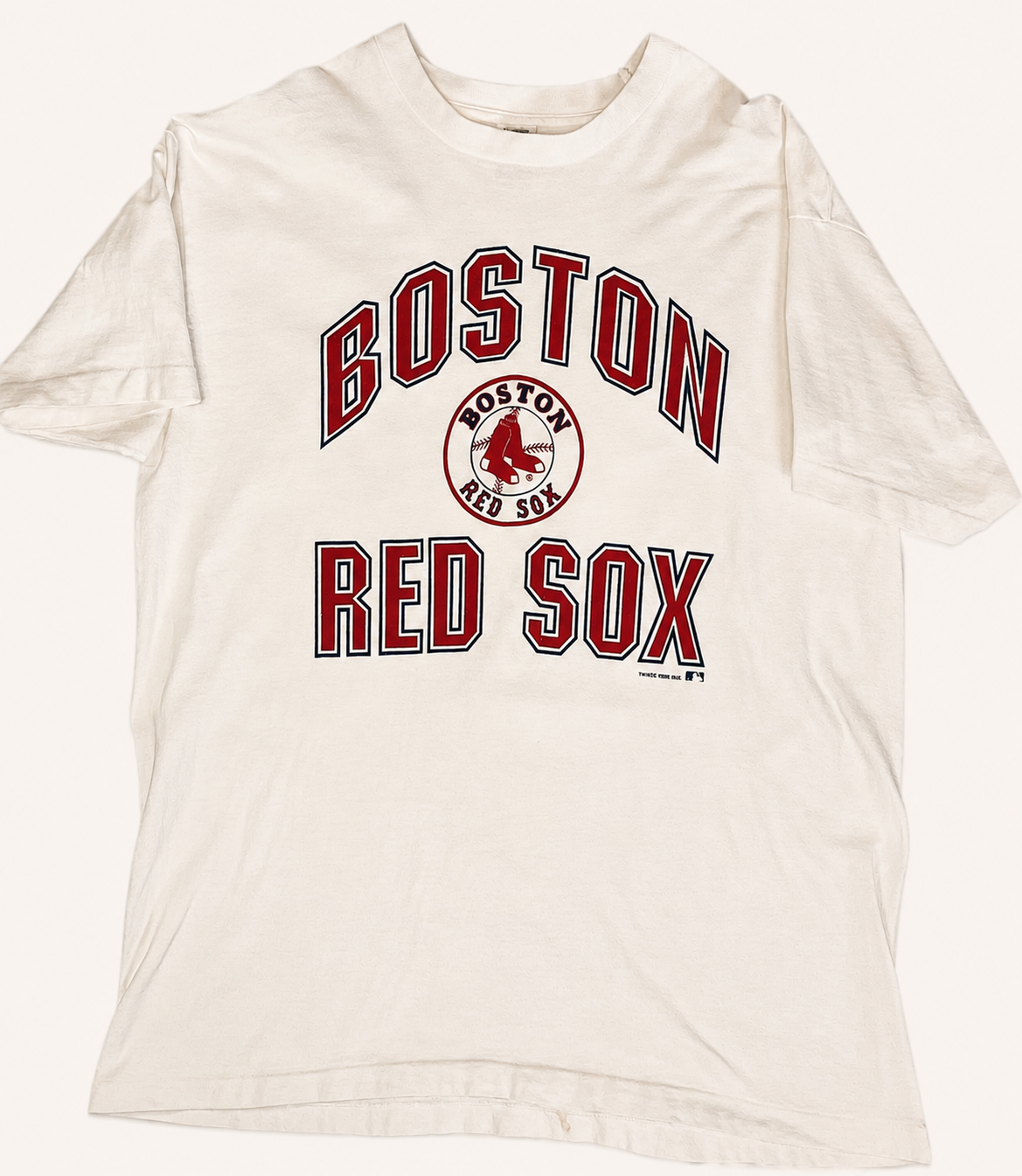 Vintage 1988 Boston Red Sox white T-shirt featuring stacked red and navy block typography framing the franchise sock emblem.