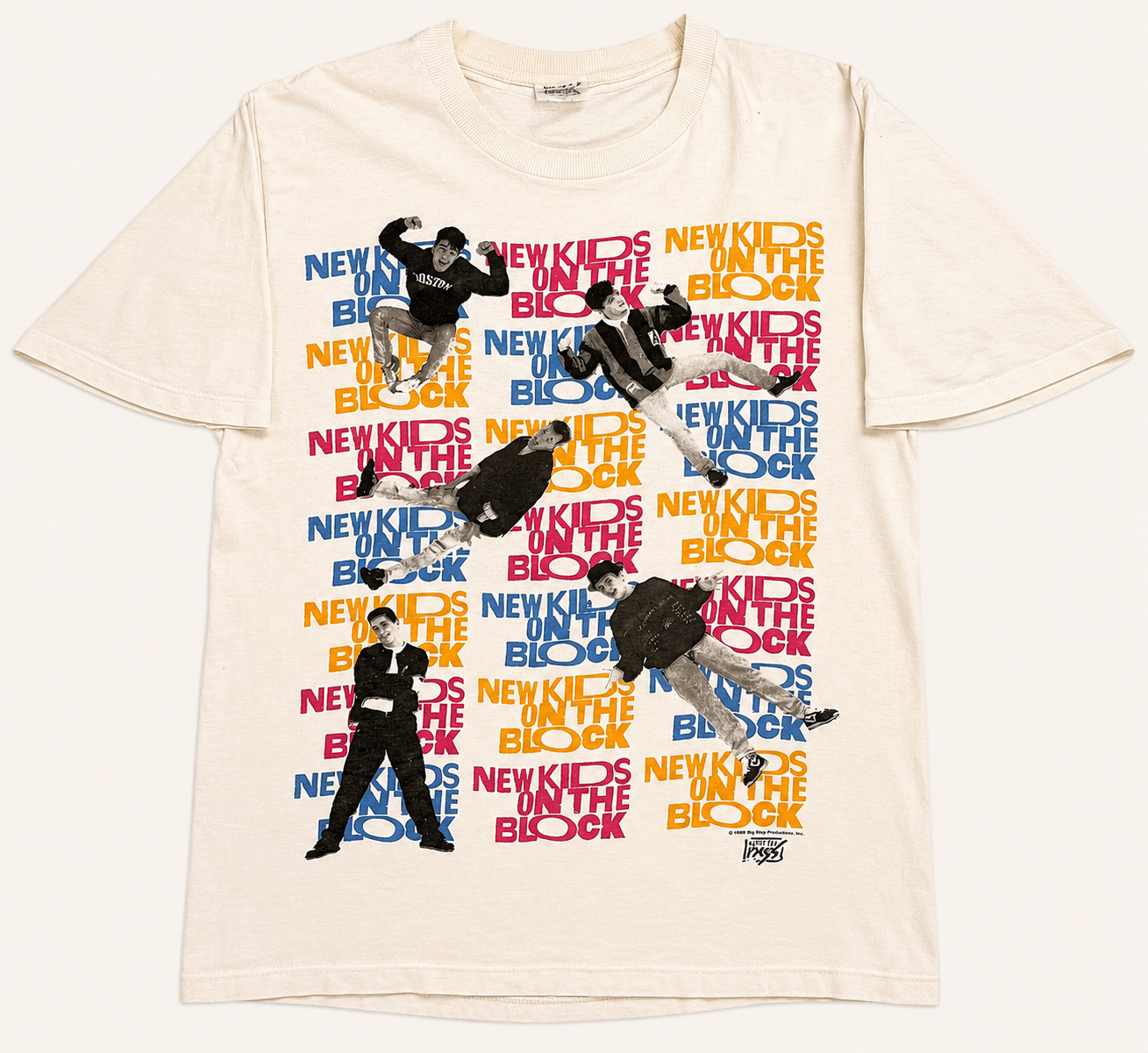 Vintage 1989 New Kids on the Block cream promo T-shirt featuring an all-over multi-photo boy band graphic.