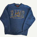 Front view of vintage late 1990s St. Louis Rams NFL royal blue crewneck sweatshirt featuring a mixed-media embroidered and screenprinted Western Division chest layout by Galt Sand