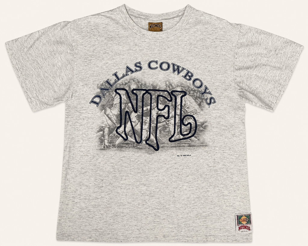Front view of vintage 1993 Dallas Cowboys NFL heather grey graphic tee with a tackle-twill embroidered center emblem and monochrome sketch graphics by Nutmeg Mills